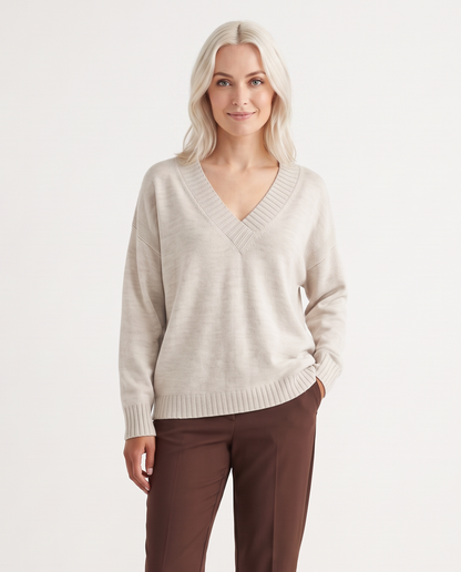 Women's Deep V-Neck Knitted Jumper Relaxed Long Sleeve Pullover in Beige – front view