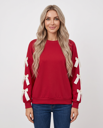 Women's red bow sleeve Christmas jumper, front view