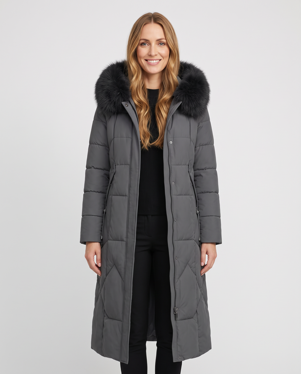 Women's grey long quilted puffer coat with faux fur collar, front view