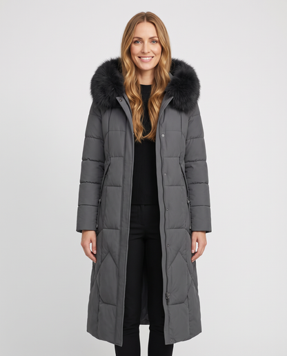 Women's grey long quilted puffer coat with faux fur collar, front view