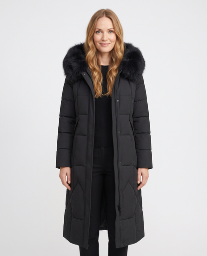 Women's black long quilted puffer coat with faux fur collar, front view