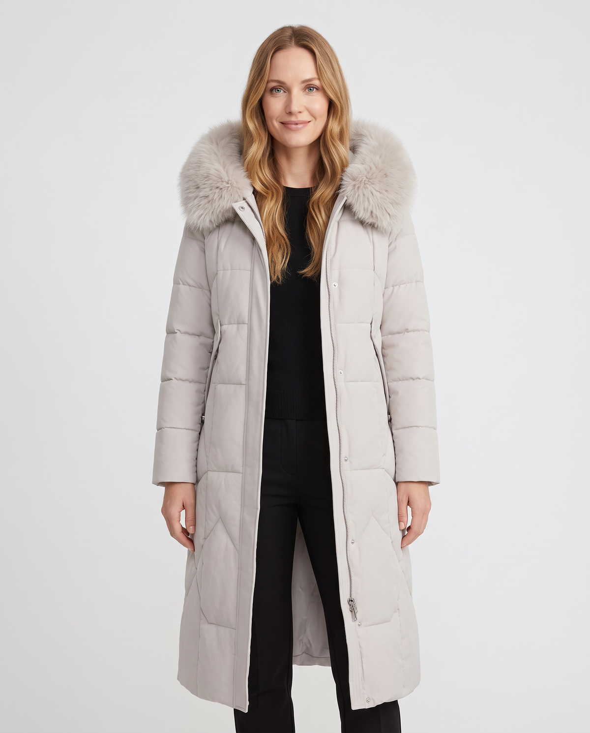 Women's cream long quilted puffer coat with faux fur collar, front view