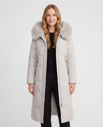 Women's cream long quilted puffer coat with faux fur collar, front view