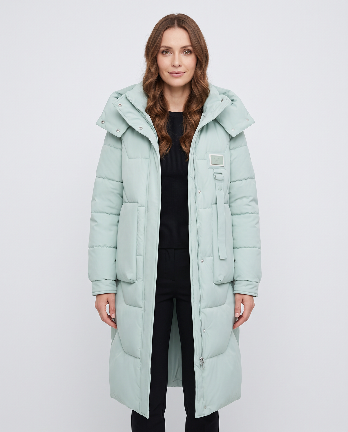 Women's mint green long hooded waterproof puffer jacket, front view