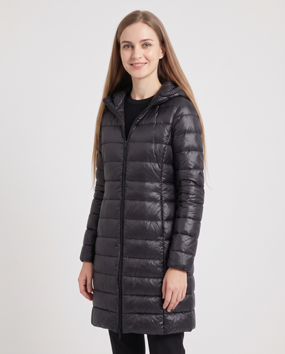 Women's black longline hooded puffer coat, side view