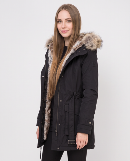 Women's black hooded parka coat with faux fur trim, side view
