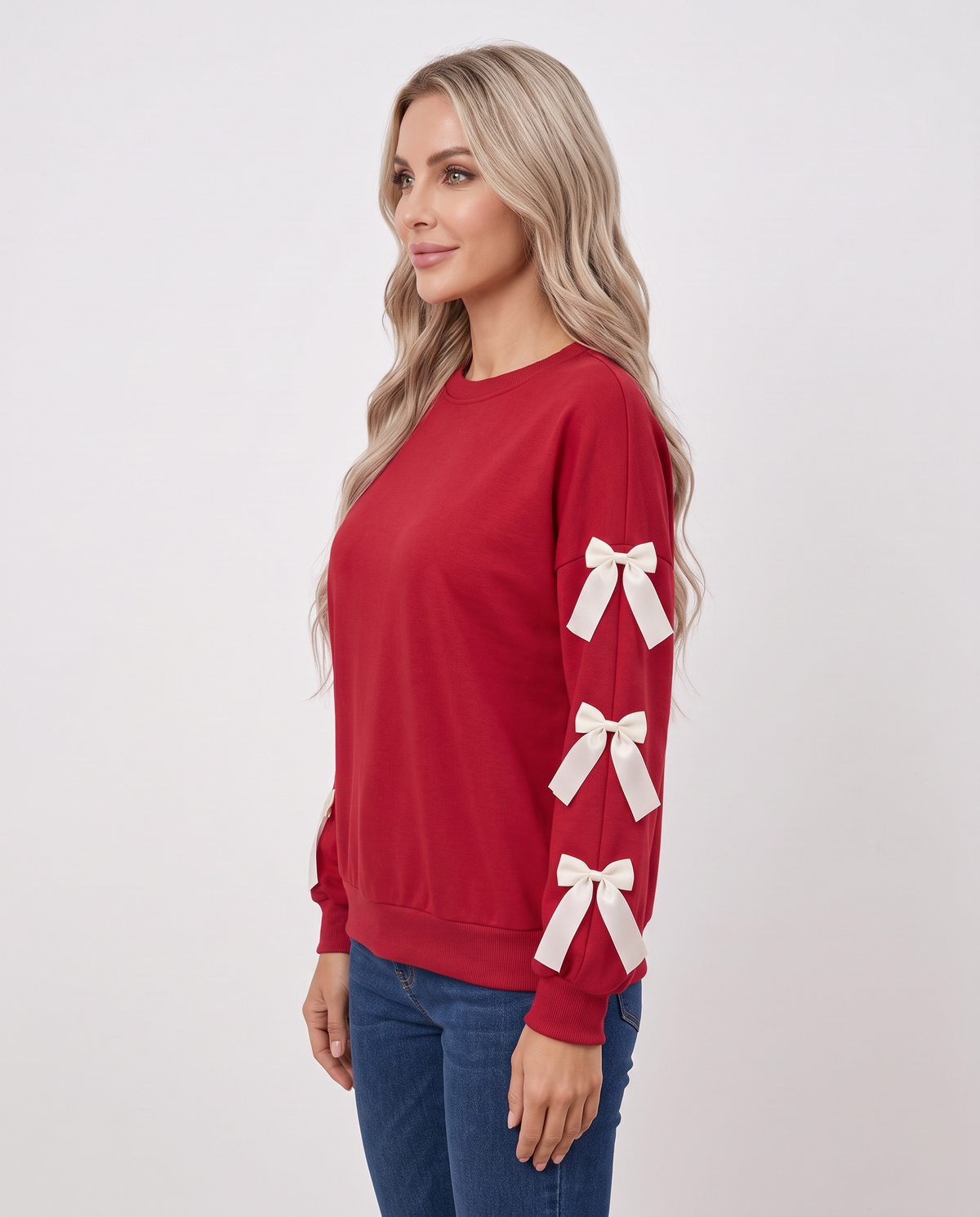Women's red bow sleeve Christmas jumper, side view