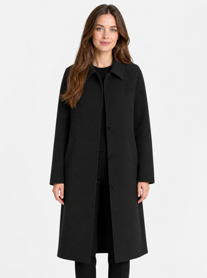 Women's Black long single breasted trench coat, front view