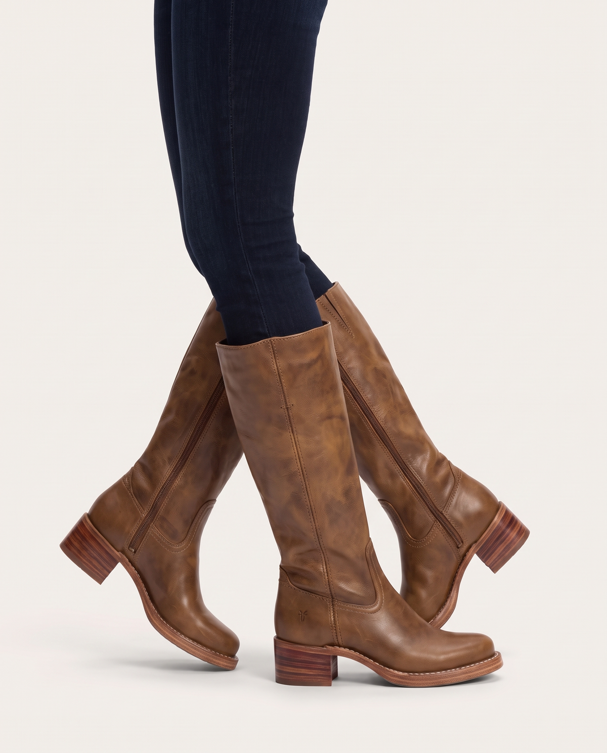 Knee-High Boots with Slim Fit and Structured Sole in Brown – side profile walking view