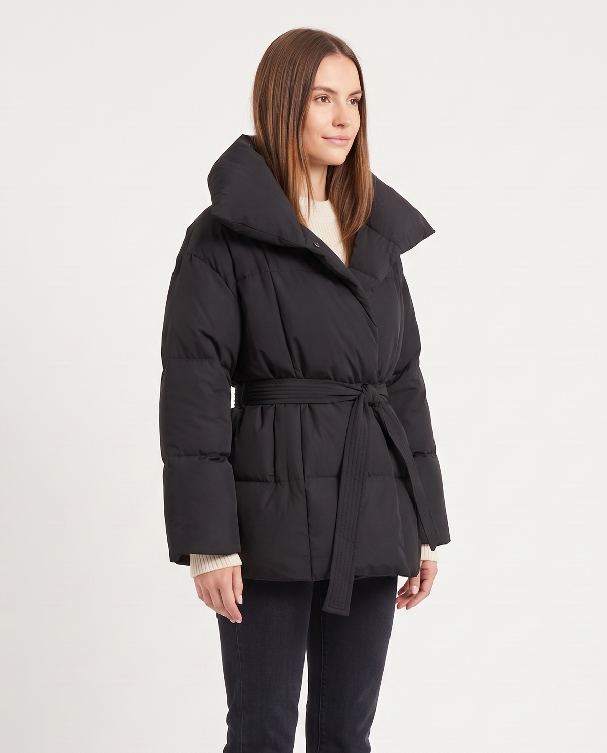 Women's Belted Puffer Jacket in Black – three-quarter view