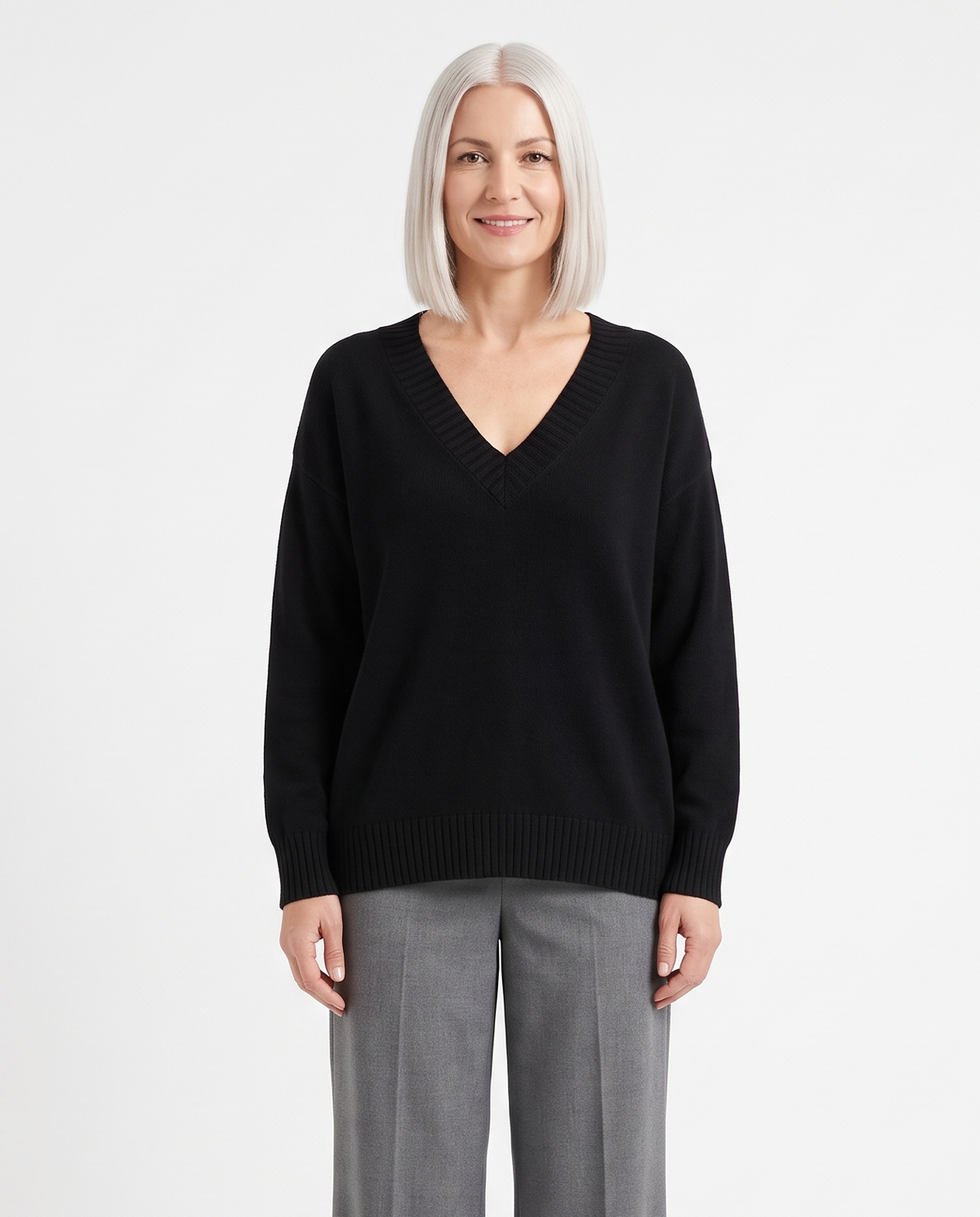 Women's Deep V-Neck Knitted Jumper Relaxed Long Sleeve Pullover in Black – front view