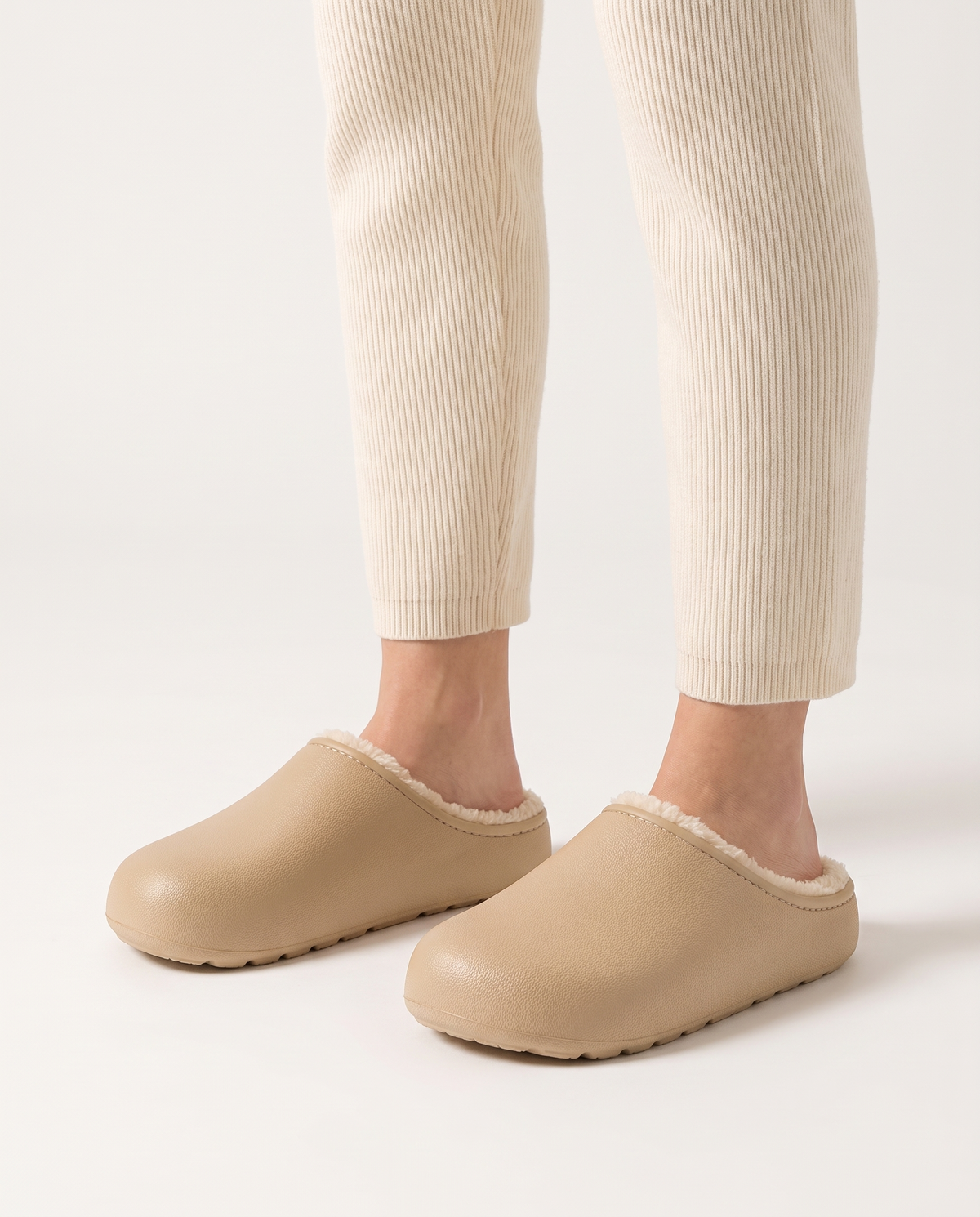 Women's Plush-Lined Winter Clog Slippers in Beige – three-quarter standing view