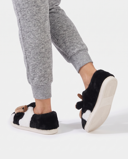 Women's Printed Plush House Slippers in Black – walking view showing the sole