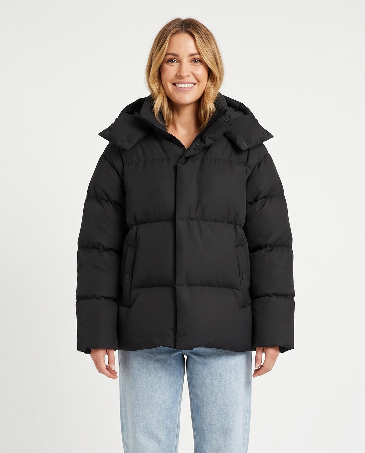 Women's Relaxed Hooded Puffer Jacket in Black – front view